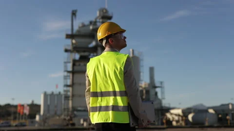 Back of Professional Heavy Industry Engineer, Worker Wearing Safety Uniform Stock Footage 237943199