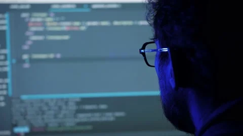 Back rear view of engineer developing software app works coding programming on Video stock 235783890