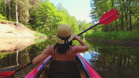 Back Rear View strong caucasian woman rowing Kayaking In Beautiful Lithuani.. Stock-Footage 244312838