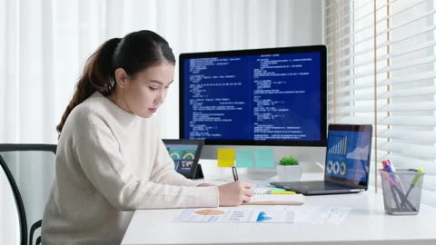 Back rear view of young asian woman, freelance data scientist work remotely 스톡 동영상 148733874