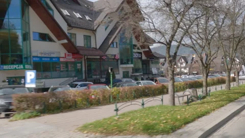 BACK RIGHT - Passenger side driving plate - Zakopane, Poland. Polandzakopane0001 Stock Footage 163227590