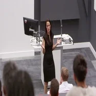 Back Row Student Pov Of Female Teacher In Lecture Theatre, Shot On R3D Stock Footage