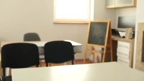 Back to school after quarantine. Children in medical masks go to class and sit Stock Footage 132127053