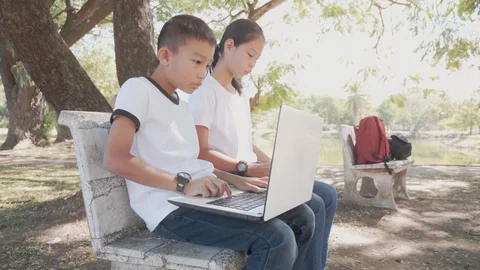 Back to School. asian boy using his laptop to learning online. Stock Footage 127181087