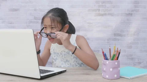 Back to School. asian girl using his laptop to learning online. Stock Footage 117392898