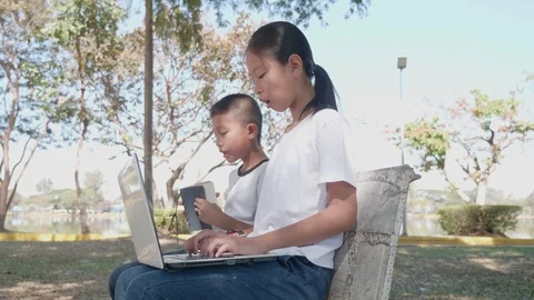 Back to School. asian girl using his laptop to learning online. Stock Footage 127181415