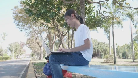 Back to School. asian girl using his laptop to learning online. Stock Footage 127185457