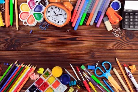 Back to School background concept. School supplies on a wooden background. Ed Stock Photos