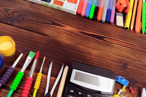 Back to School background concept. School supplies on a wooden background. Ed Stock Photos