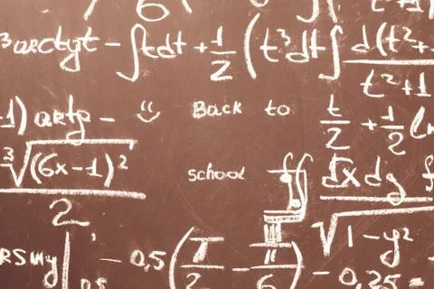 Back to school background with math formulas are written by white chalk on the Stock Photos