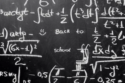 Back to school background with math formulas are written by white chalk on the Stock Photos