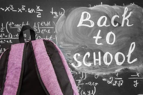 Back to school background with purple school bag  and the title "Back to schoo Stock Photos