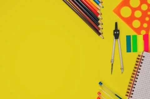 Back to school background for text, pens, colored pencils, notebook, ruler, c Stock Photos