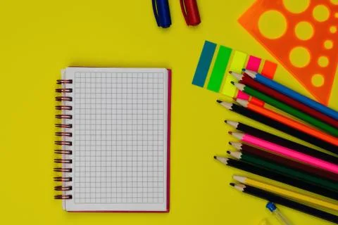 Back to school background for text, pens, colored pencils, notebook, ruler, c Stock Photos