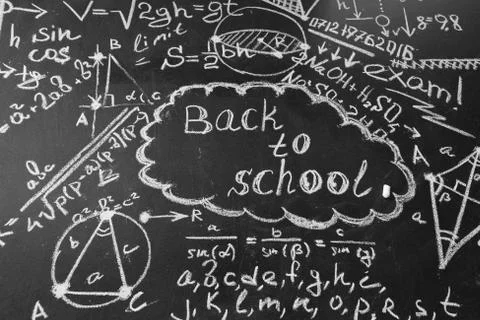 Back to school background  title "Back to school" and formulas written by whit Stock Photos
