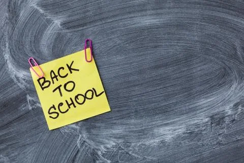 Back to school background with title "Back to school"  on yellow piece of pape Stock Photos