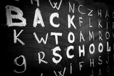 Back to school background with title "Back to school" among other letters of Stock Photos