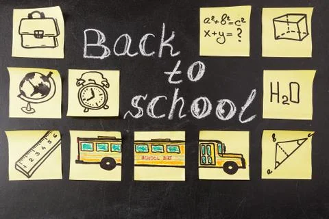 Back to school background with title "Back to school" written by white chalk and Stock Photos