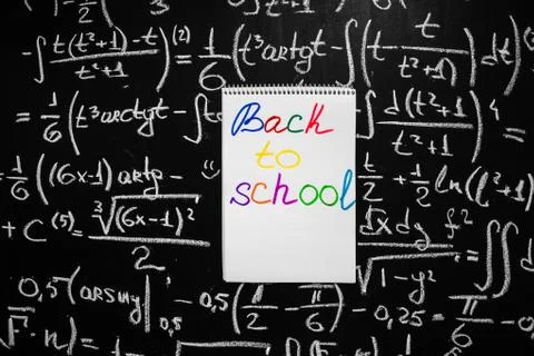 Back to school background with title Back to school written on the white page of Stock Photos