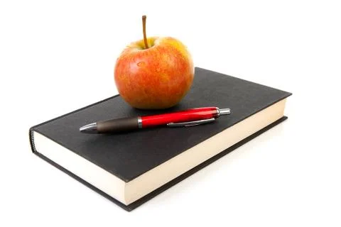 Back to school: black book with apple and pencil Stock Photos