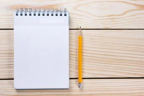 Back to school. Blank note pad, notebook with pen and glasses Stock Photos