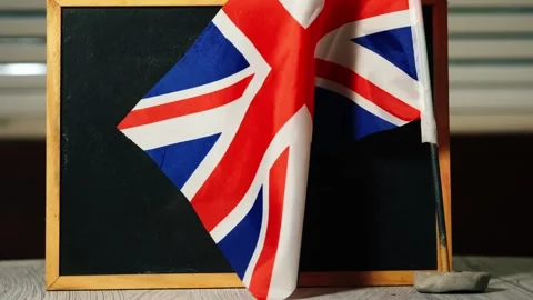 Back to school with British Union Jack flag chalk black board Stock Footage 318906415
