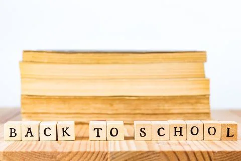 Back to school caption made out of letter tiles. Stock Photos
