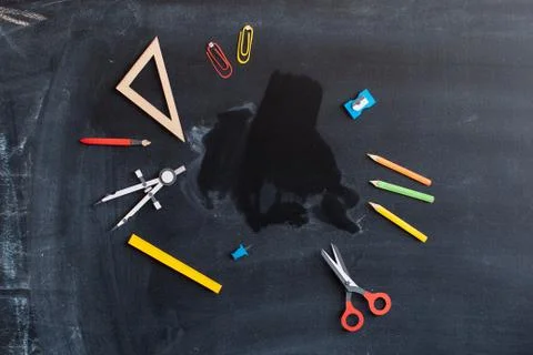 Back to school on chalkboard background. Stock Photos