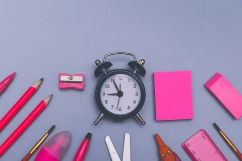 Back to school concept background with pink school accessories. Stock Photos
