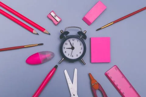 Back to school concept background with pink school accessories. Stock Photos