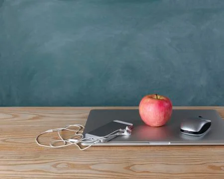 Back to school concept with basic modern technology on desktop Stock Photos