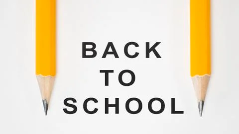Back to school concept. Close-up two yellow pencils. Stock Photos