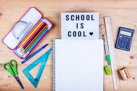 Back to school concept. Flat lay of stationery for the student - scissors, sh Stock Photos