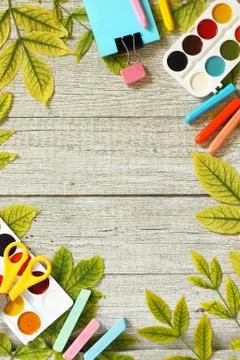 Back to school concept. Flatlay background. Table with autumn leaves. Stock Photos