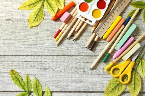 Back to school concept. Flatlay background. Table with autumn leaves. Stock Photos