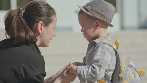 Back to school concept, mother sending baby boy child to school first time 動画素材 196869139