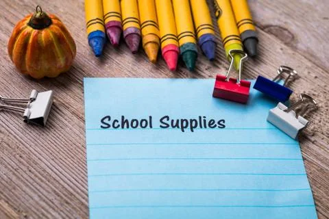 Back to School concept on notebook and wooden board Stock Photos