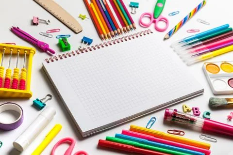 Back to school concept. Open notebook with school supplies Stock Photos