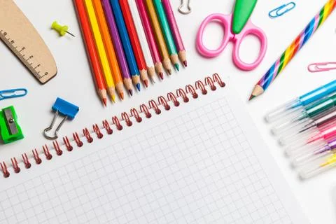 Back to school concept. Open notebook with school supplies Stock Photos
