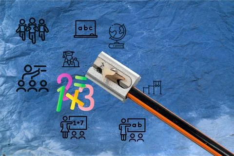 Back to school concept. A pencil sharpener with the numbers 1, 2, 3, and x on Stock Photos