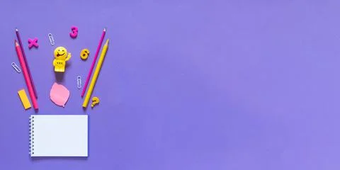Back to school concept. School and office supplies on the office table. Violet Stock Photos