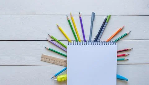 Back to school concept school office supplies on a white wooden background Stock Photos