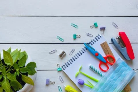 Back to school concept school office supplies on a white wooden background Stock Photos