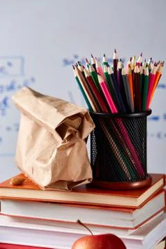 Back to School concept, school supplies, biscuits, packed lunch and lunchbox Stock Photos