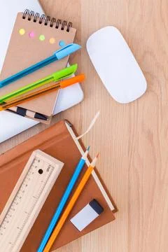 Back to school concept with school supplies laptop ,book, pen,mouse,and col.. Stock Photos