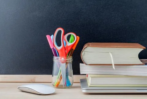 Back to school concept with school supplies laptop ,book, pen,mouse,and col.. Stock Photos