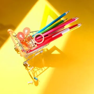 Back to school concept on yellow background. Stock Photos