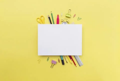 Back to school conceptual flat lay with different office supply objects and copy Stock Photos