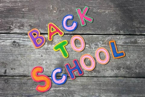 Back to School desk table top view, words on grunge old wooden board background Stock Photos