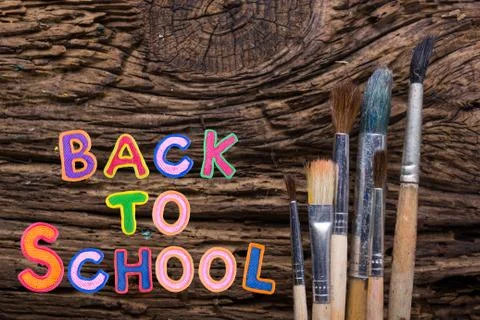 Back to School desk table top view, words on grunge old wooden board background Stock Photos